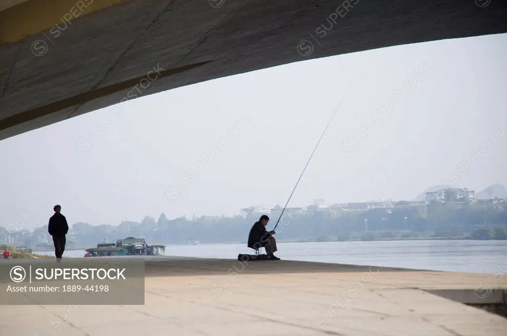 Man fishing on Li River