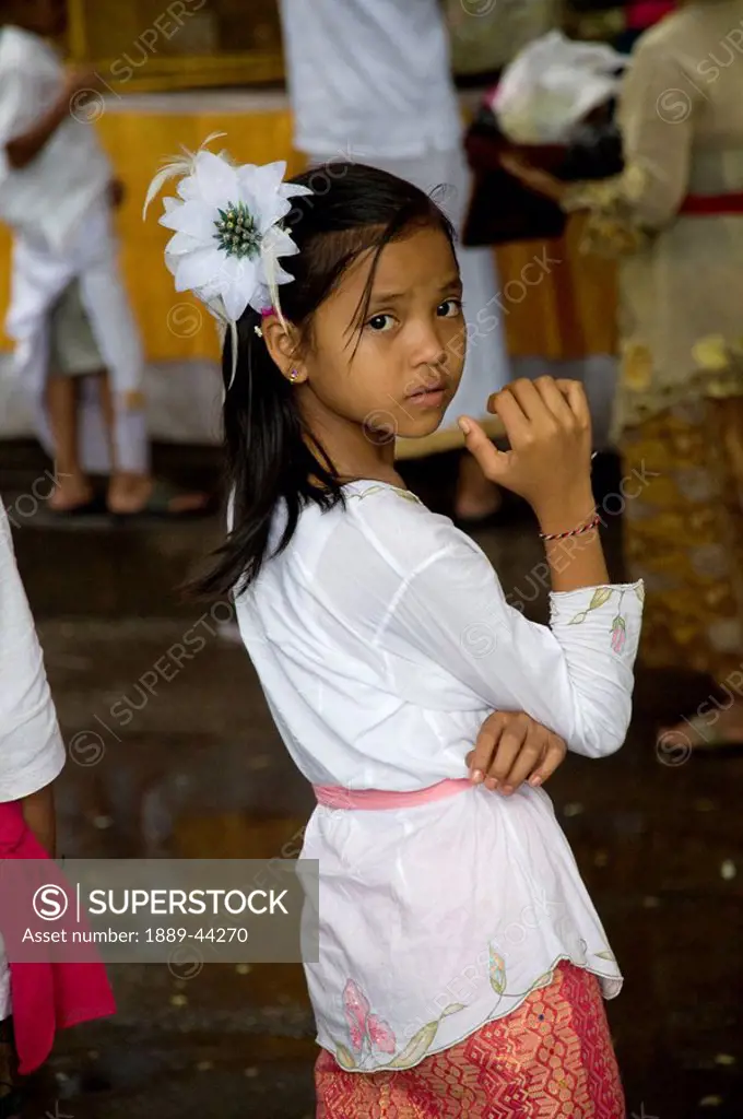 Young girl with flower in hair at Pura Pulaki