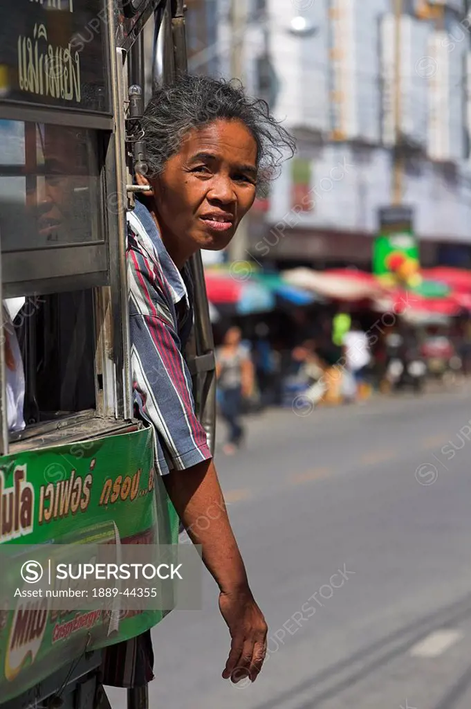 Woman in a street vending vehicle