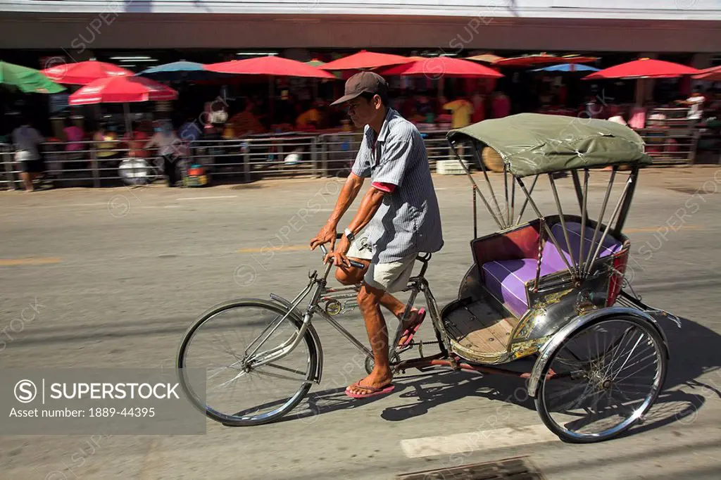 Man on a tricycle