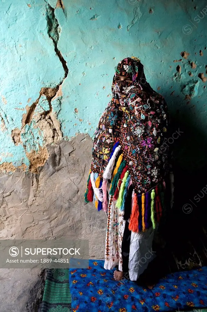 Woman standing in Siwan house