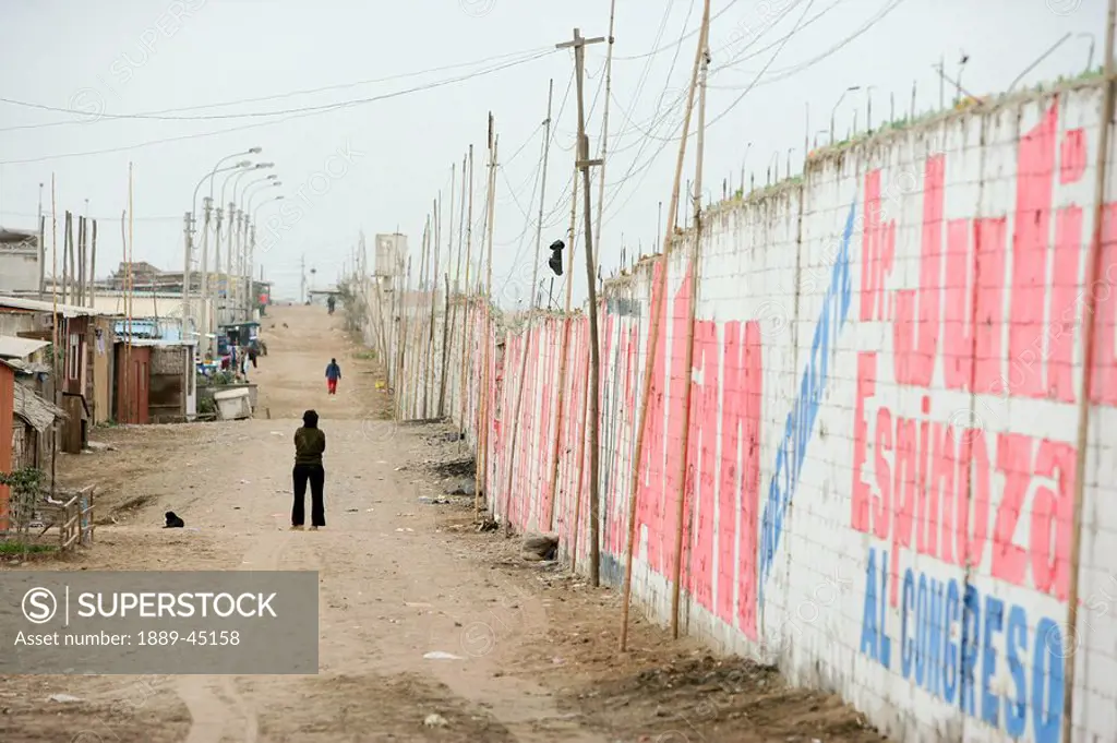 Fence by road, Lima, Peru