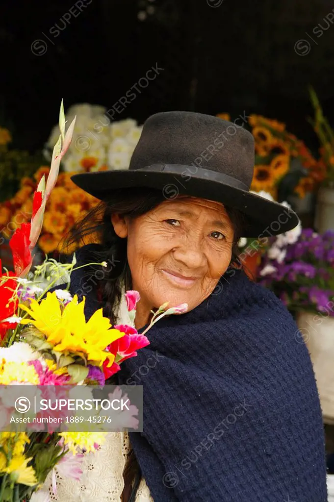 Senior woman in flower shop, Lima, Peru