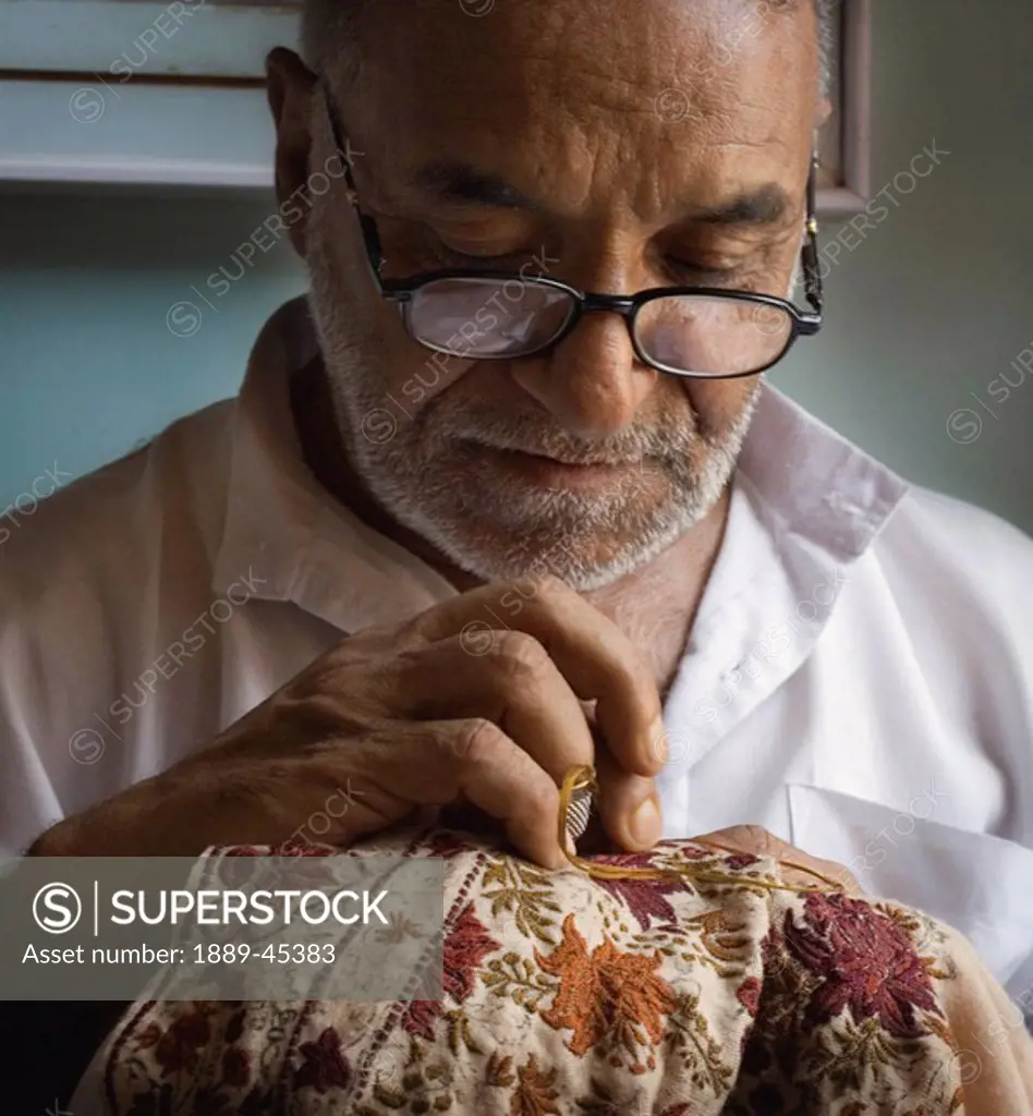 Man doing needlework