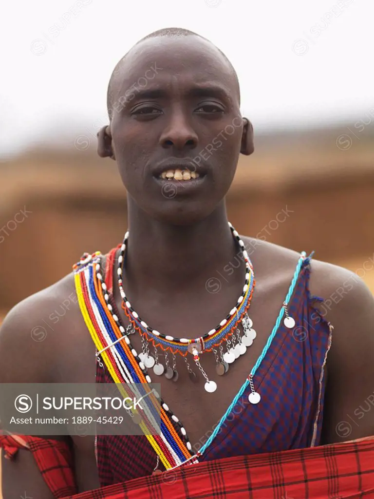 Man in Maasai village, Kenya, Africa