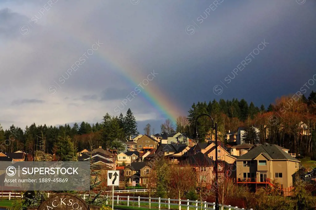 rainbow over a residential area