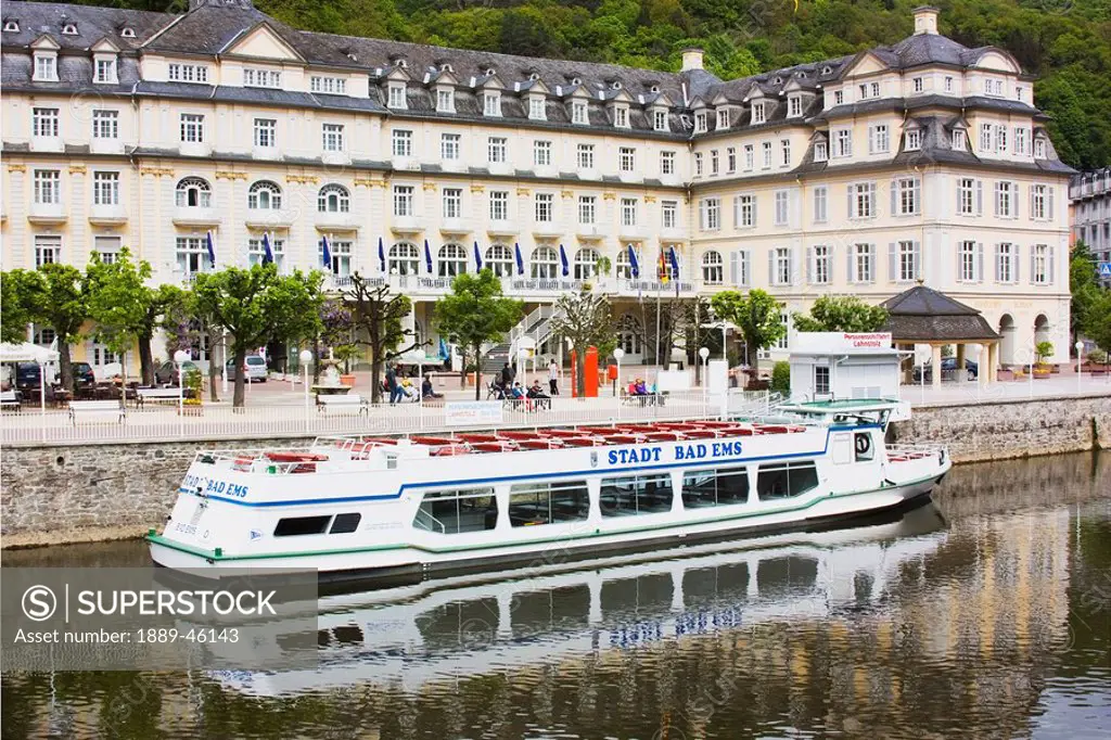 bad ems, rheinland_pfalz, germany, a boat and building on the waterfront of the river lahn