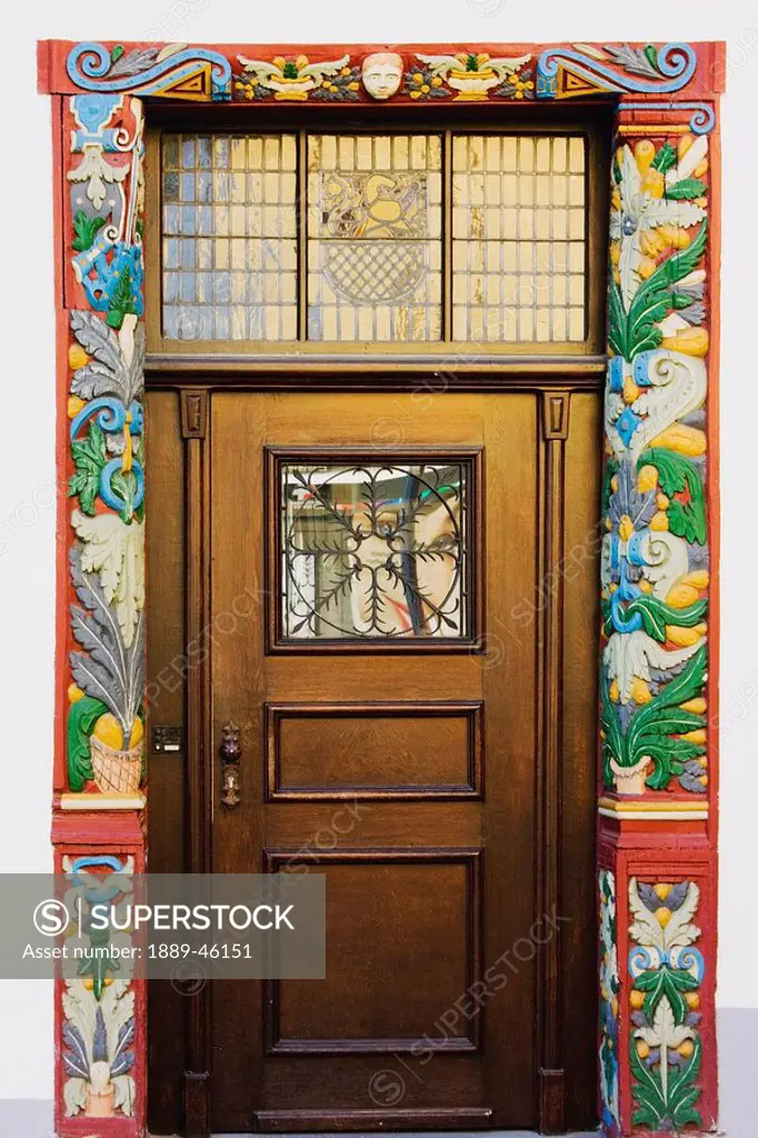 nassau, rheinland_pfalz, germany, a door surrounded by colorful wallpaper