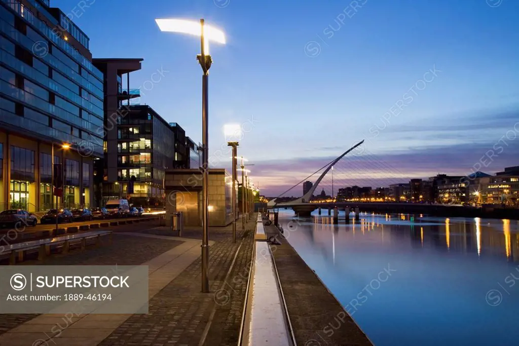 dublin, ireland, river liffey at sunset with the dublin city skyline