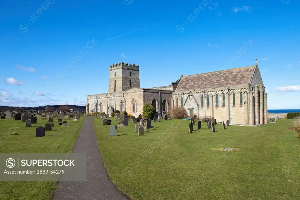 bamburgh, northumberland, england, a church cemetery