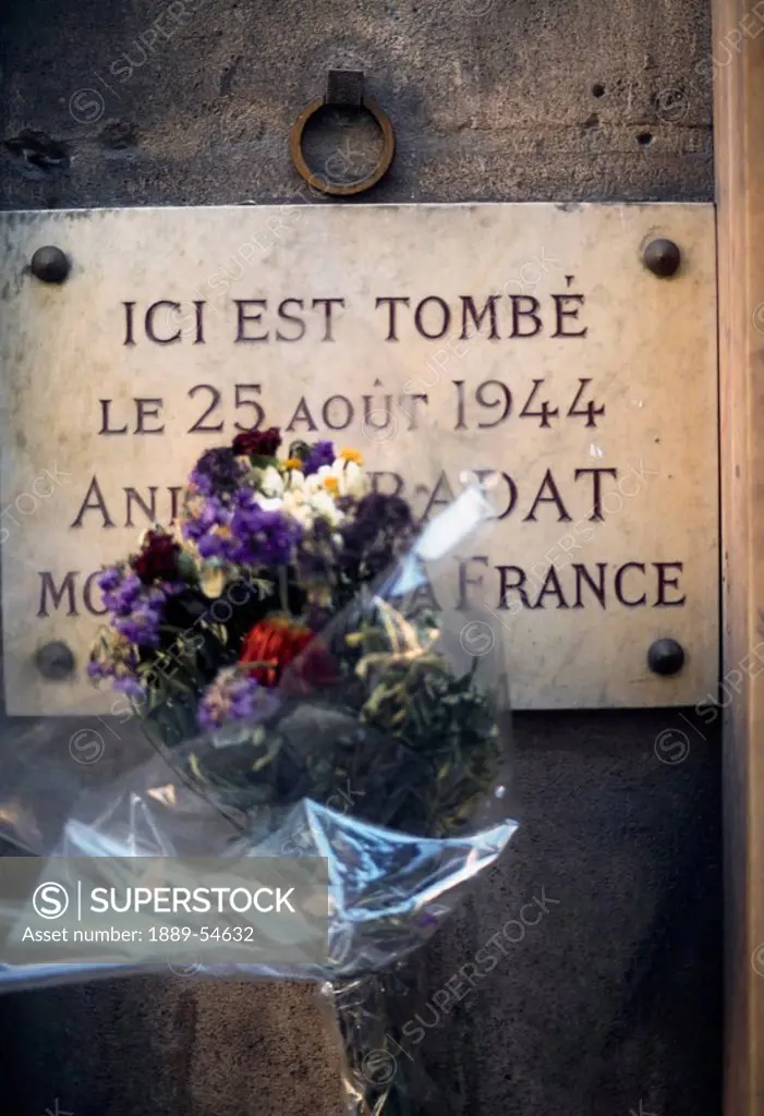 Commemoration Plaque Of Frenchman Shot On Day Of Liberation 1944, Paris, France, Bouquet In Front Of A Commemoration Plaque