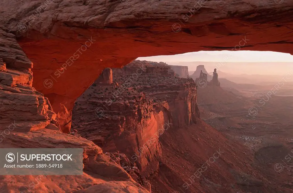 Utah, United States Of America, Washer Woman Arch Viewed Through Mesa Arch At Sunrise In Canyonlands National Park