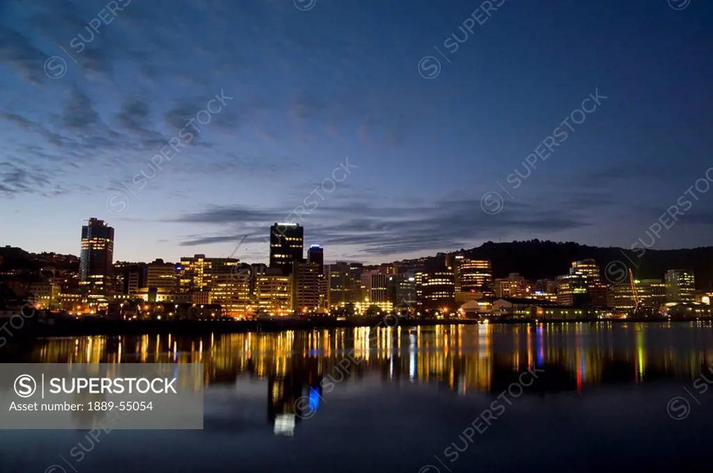 Mount Wellington, Auckland City, New Zealand, City Centre Illuminated At Night And Reflecting In The Water