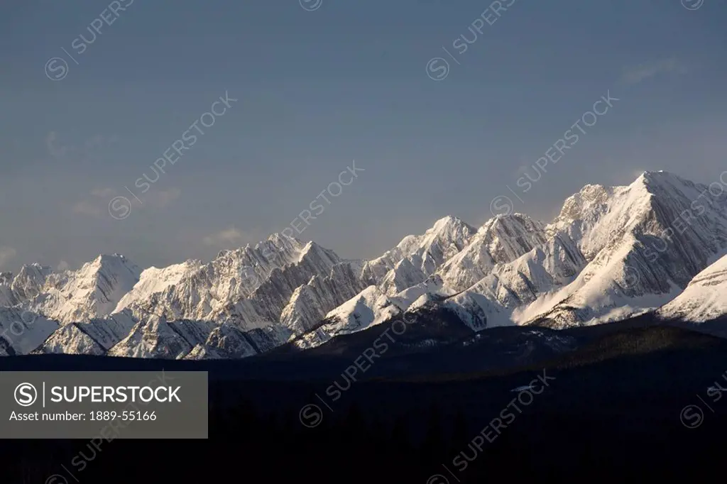 alberta, canada, snow covered mountain range in kananaskis country