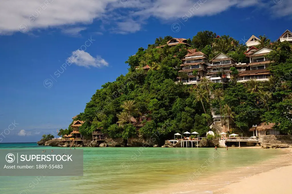 balabag, aklan, philippines, houses up on a cliff along the coast of boracay island