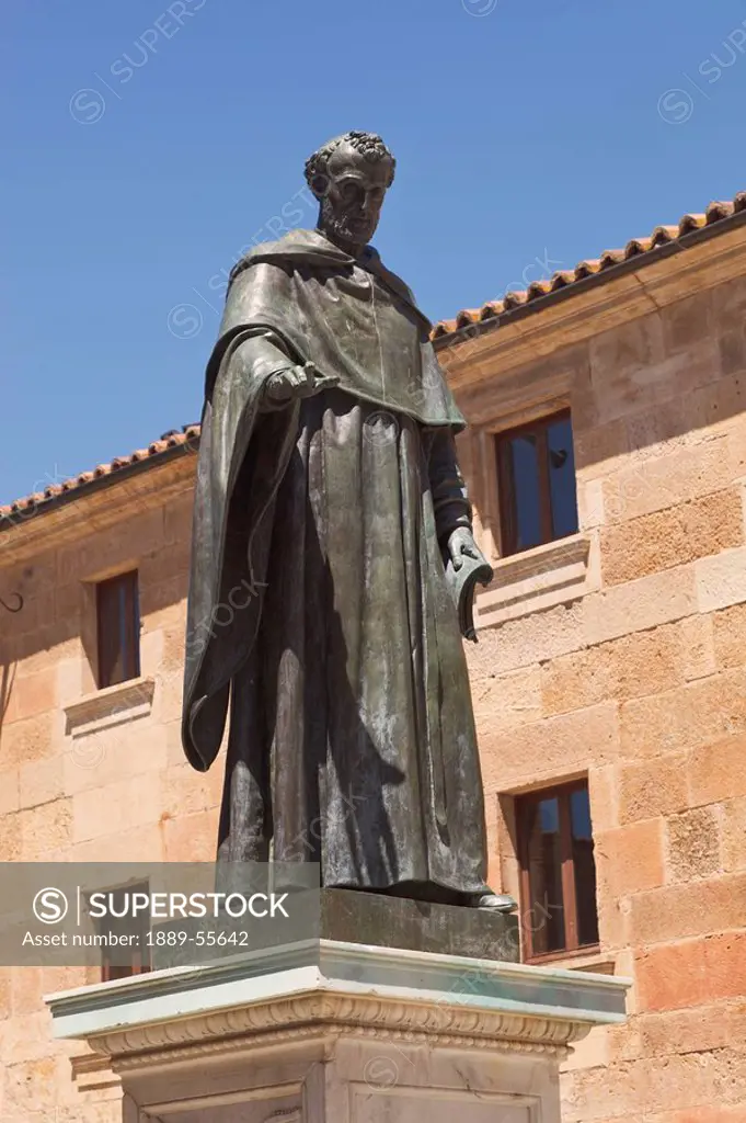 statue of augustinian friar fray luis ponce de león by nicasio sevilla in front of the escuelas mayores or university building, salamanca, salamanca p...