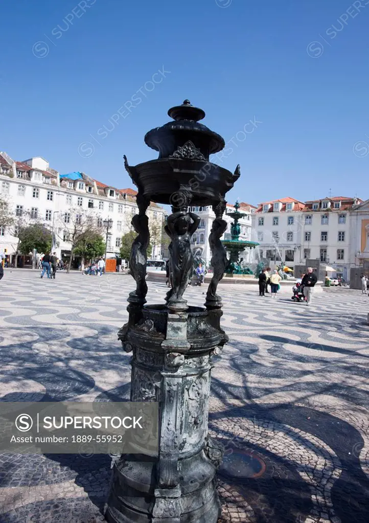 a statue in rossio, lisbon, portugal