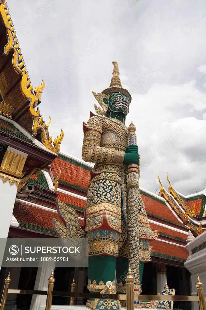 giant demons protect the wat phra kaew temple, bangkok, thailand