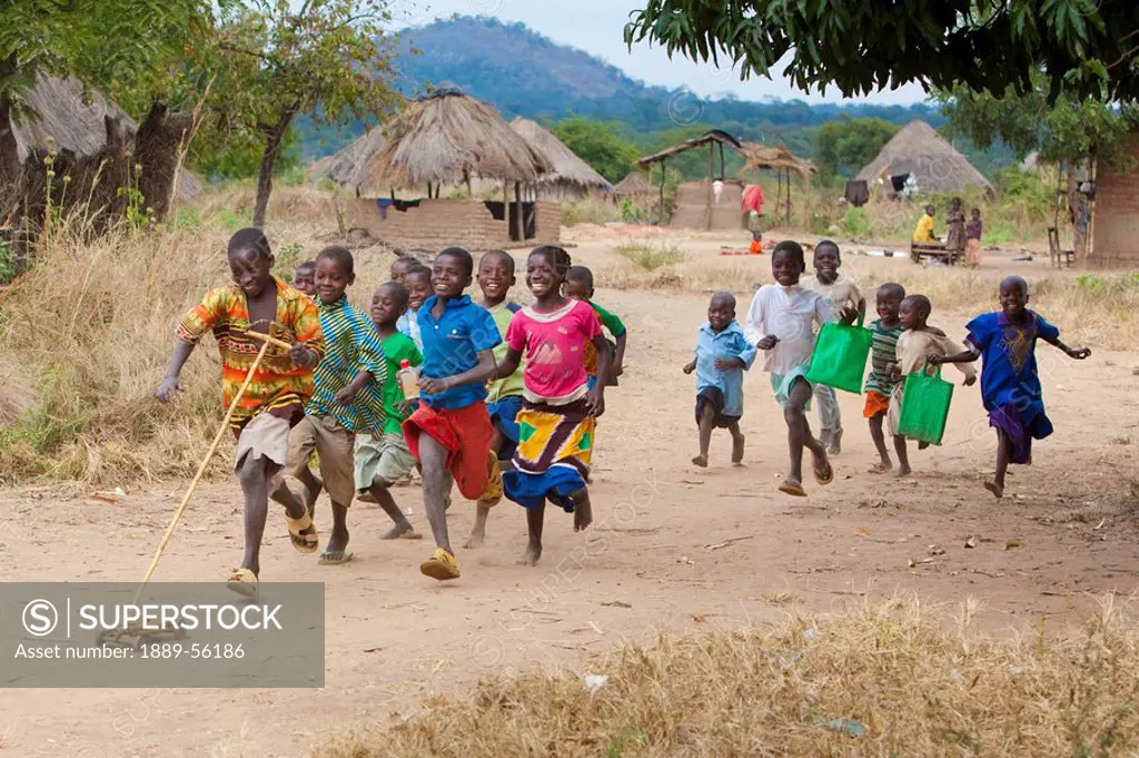 children running and playing, manica, mozambique, africa