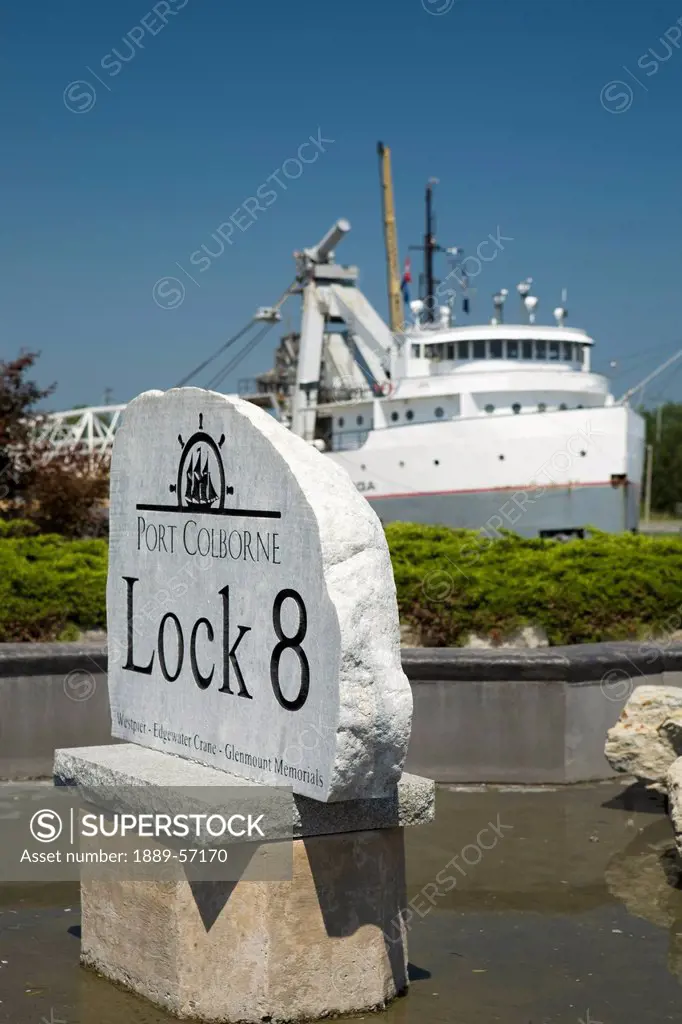 Lock 8 Port Colborne Sign With A Ship In The Background, Port Colborne, Ontario, Canada
