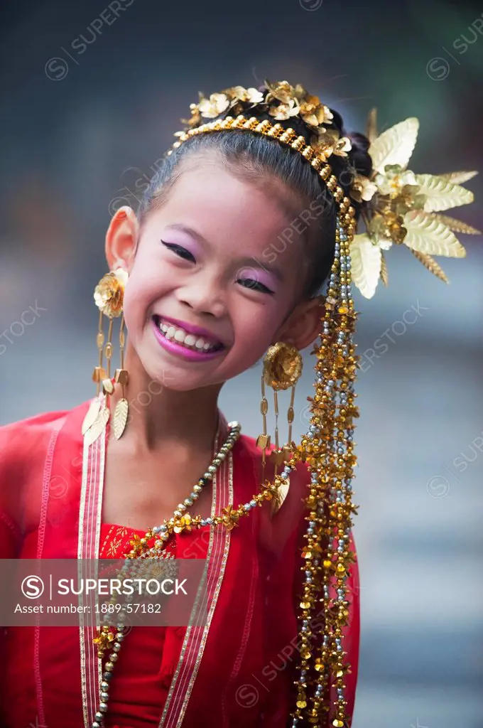 Young Thai Girl Performs Traditional Dance At Doi Sutep Temple, Chaing Mai, Thailand