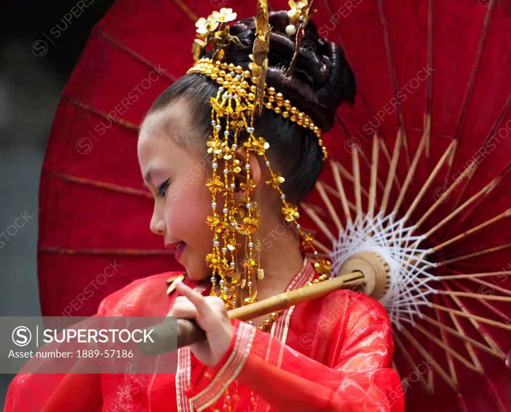 Young Thai Girl Performs Traditional Dance At Doi Sutep Temple, Chiang Mai, Thailand