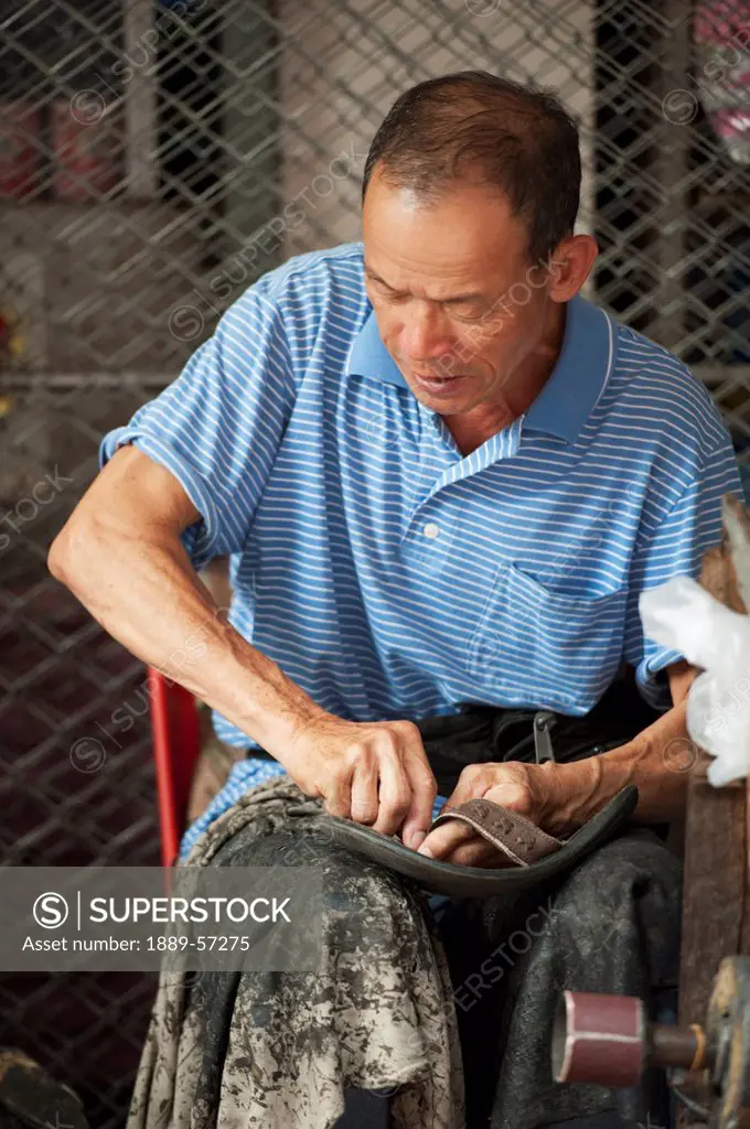 A Man Fixing A Shoe, Chiang Mai, Thailand