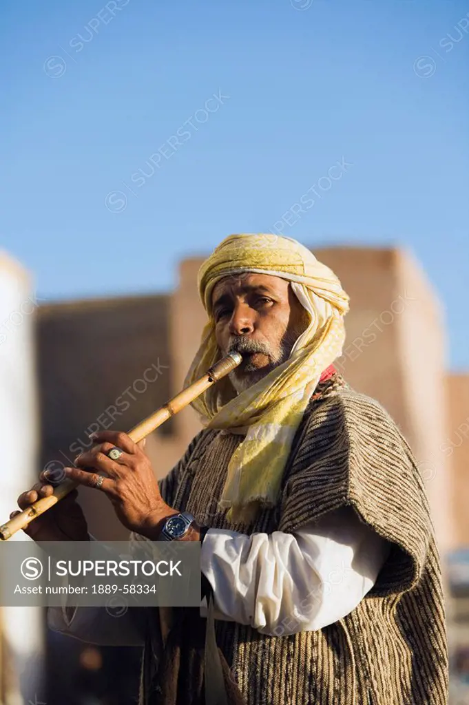 Man playing flute in Essaouira, Morocco