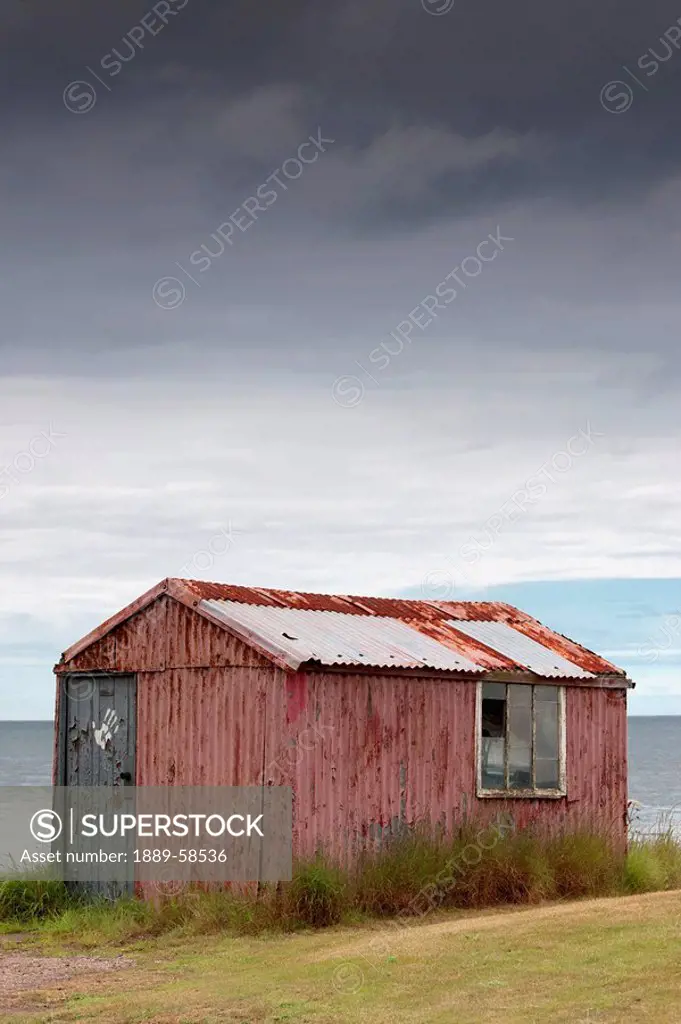 Dilapidated, weather_beaten shed