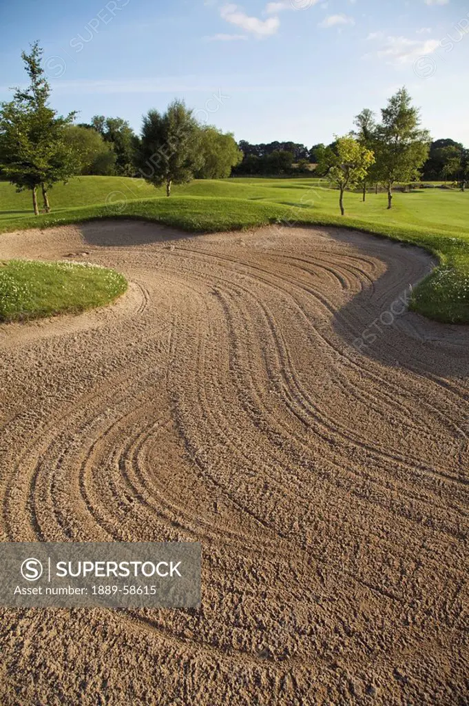 Large sand trap on golf course