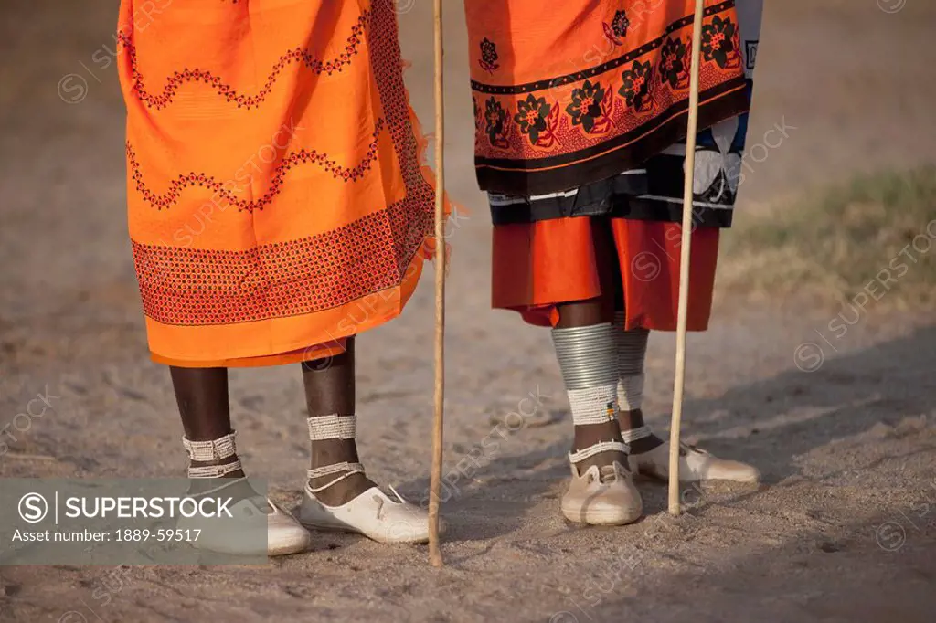 The feet of two Maasai women, Kenya, Africa