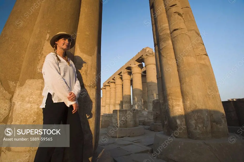 Woman tourist at the Temple of Luxor, Luxor, Nile Valley, Egypt