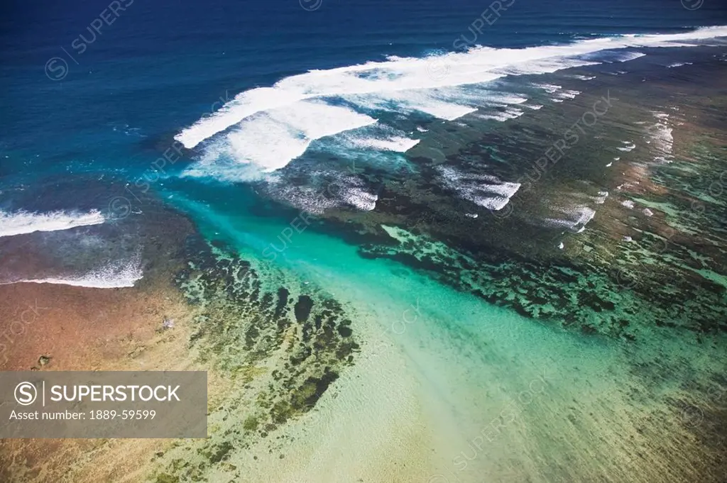 Aerial view over the reefs on the southern coast of the Bukit Peninsula of Bali, Indonesia