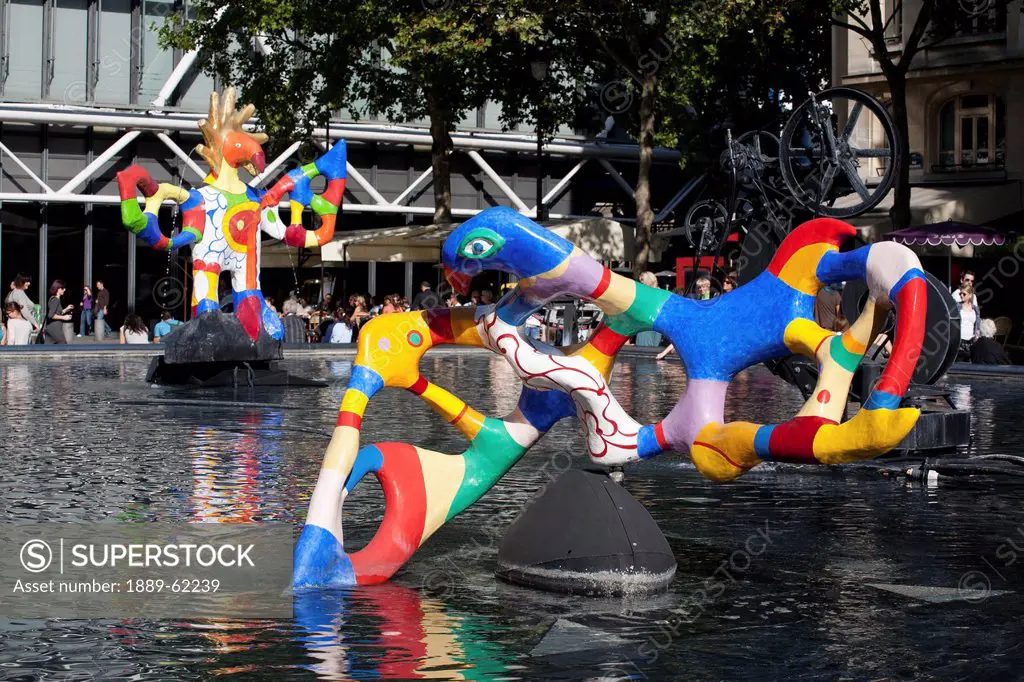 colourful sculptures in a pool, paris, france