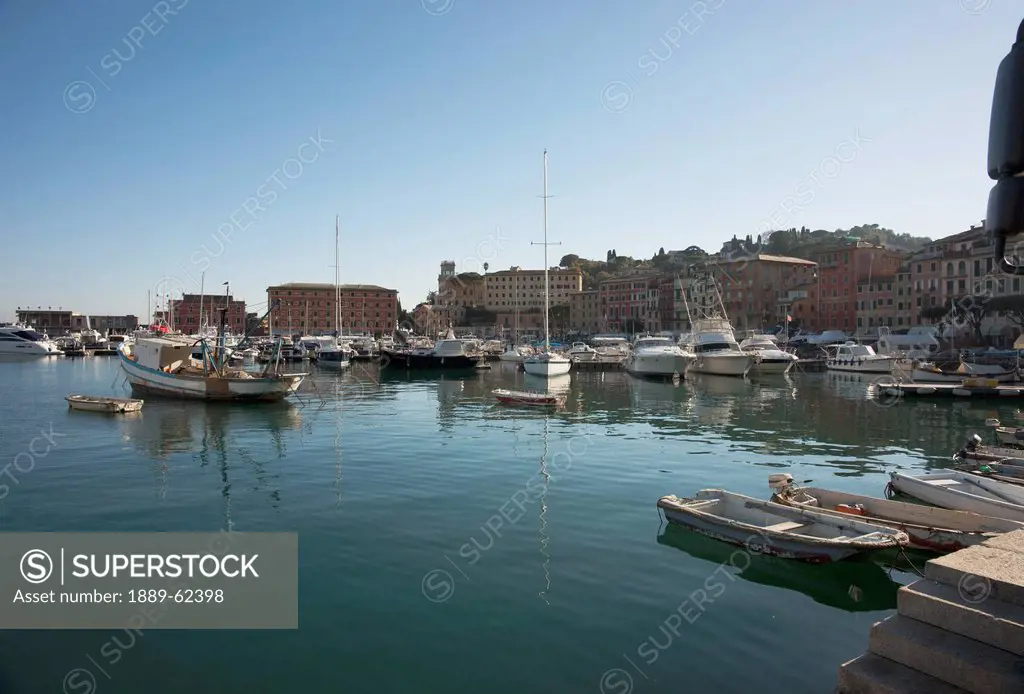 boats moored in the harbor, santa margherita, liguria, italy