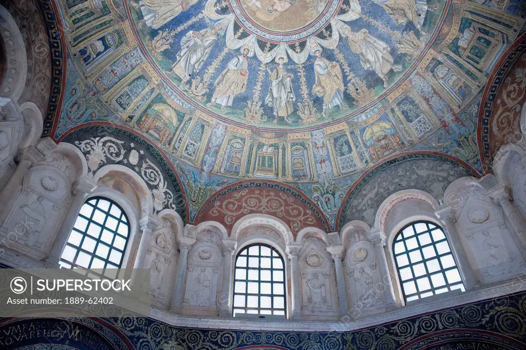 arch windows with decorative stucco reliefs in a domed ceiling in the neonian baptistry, ravenna, emilia_romagna, italy