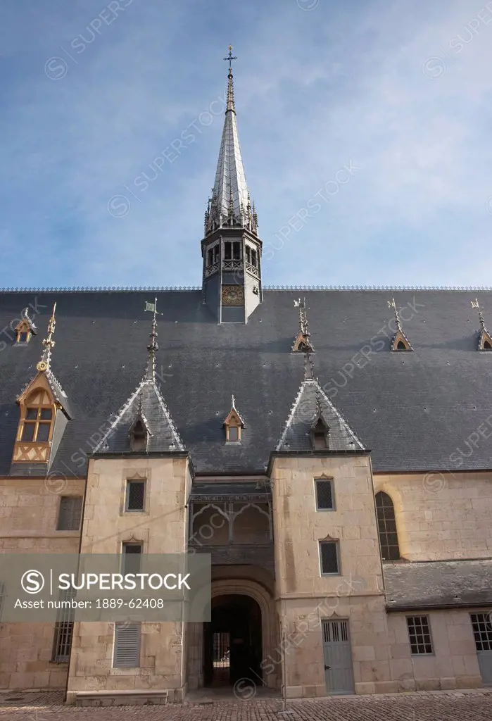 roof and steeple of hospices de beaune, beaune, cote d´or, franc