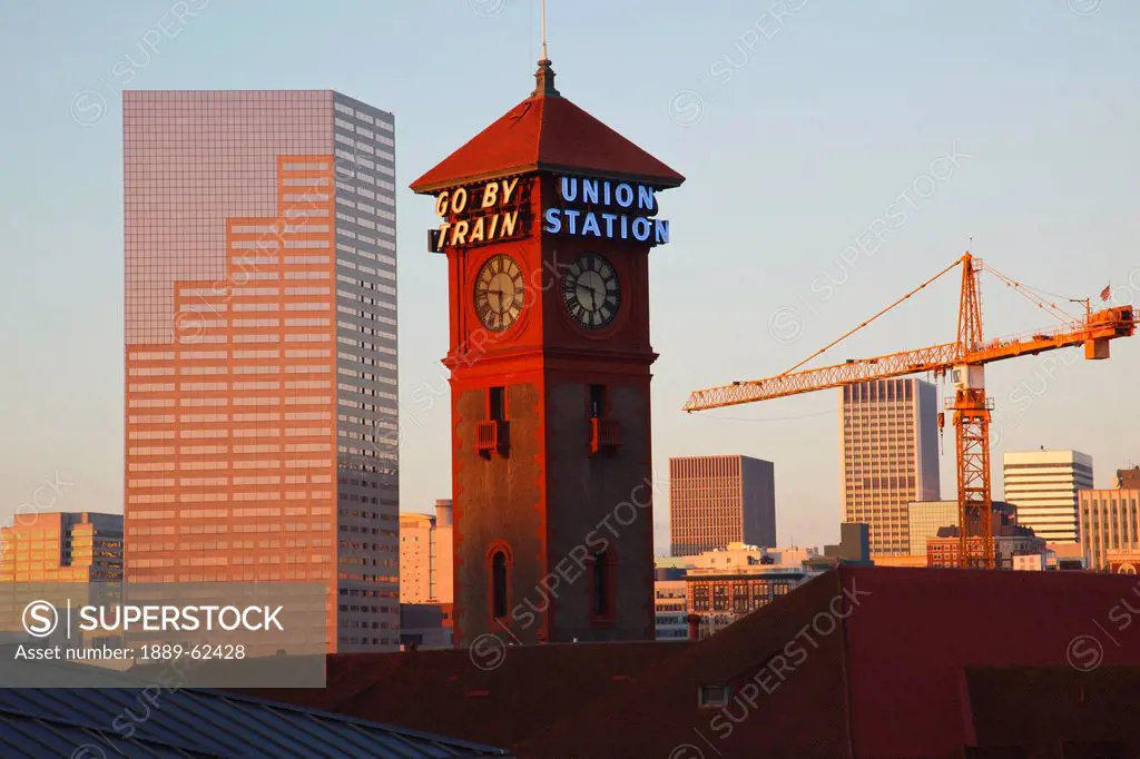 clock tower of union station in the city skyline, portland, oregon, united states of america