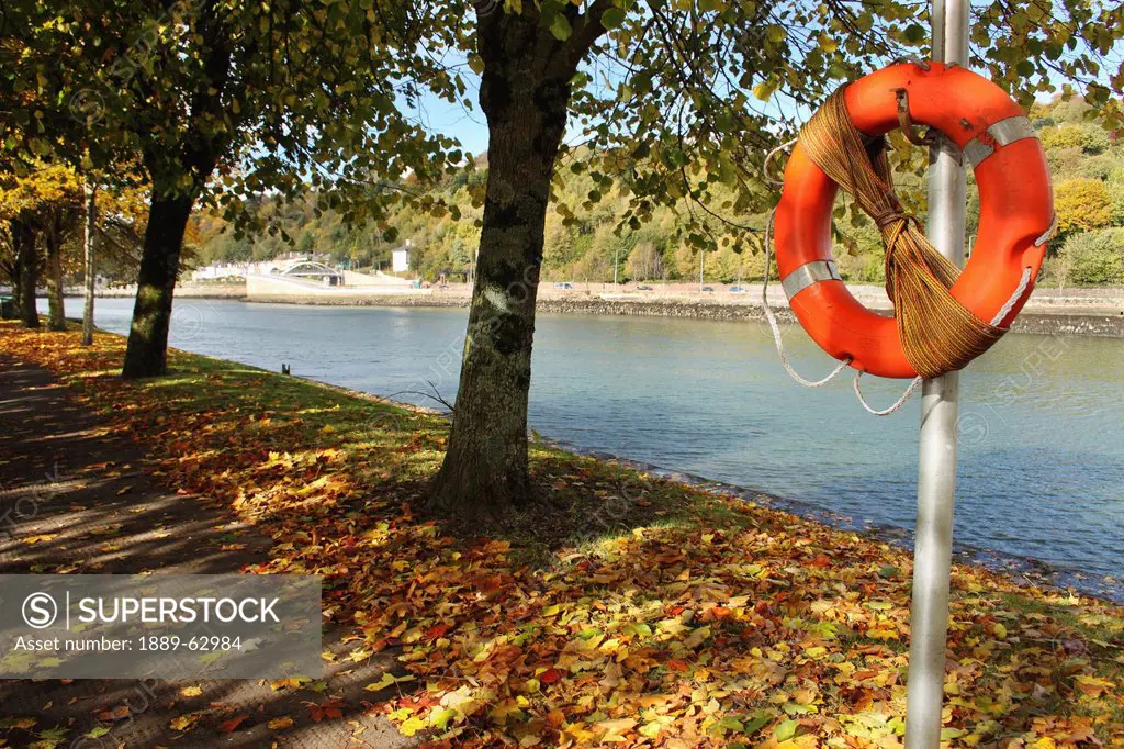 life buoy by the river lee in munster region, cork city, county cork, ireland