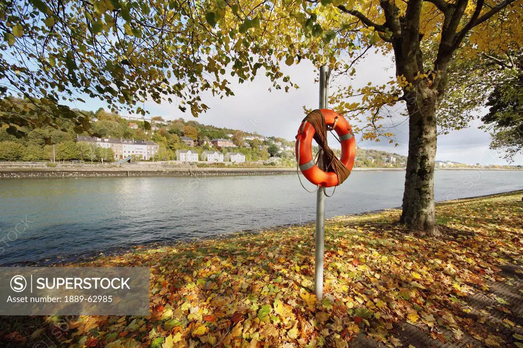 life buoy by the river lee in munster region, cork city, county cork, ireland
