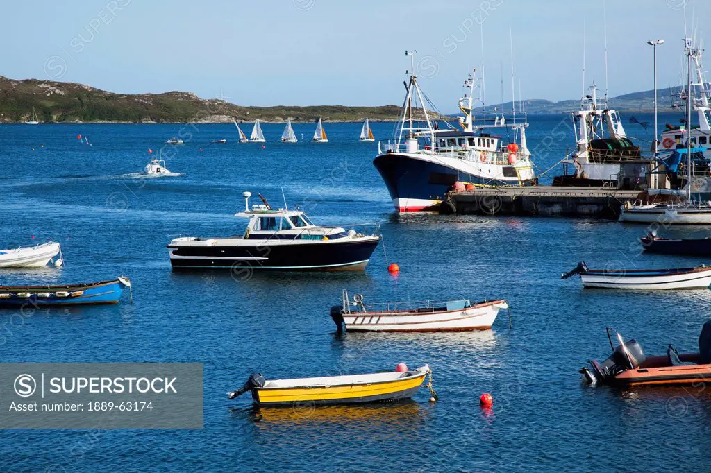boats in the harbor, schull, county cork, ireland