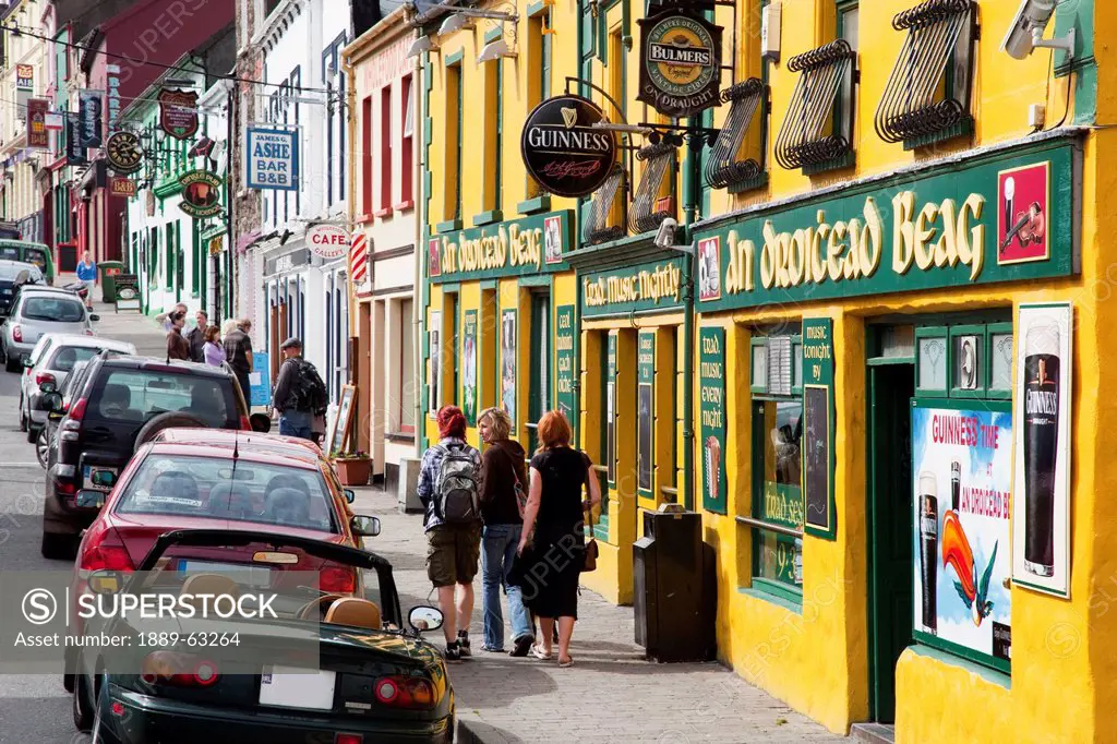 main street of irish town, dingle, county kerry, ireland