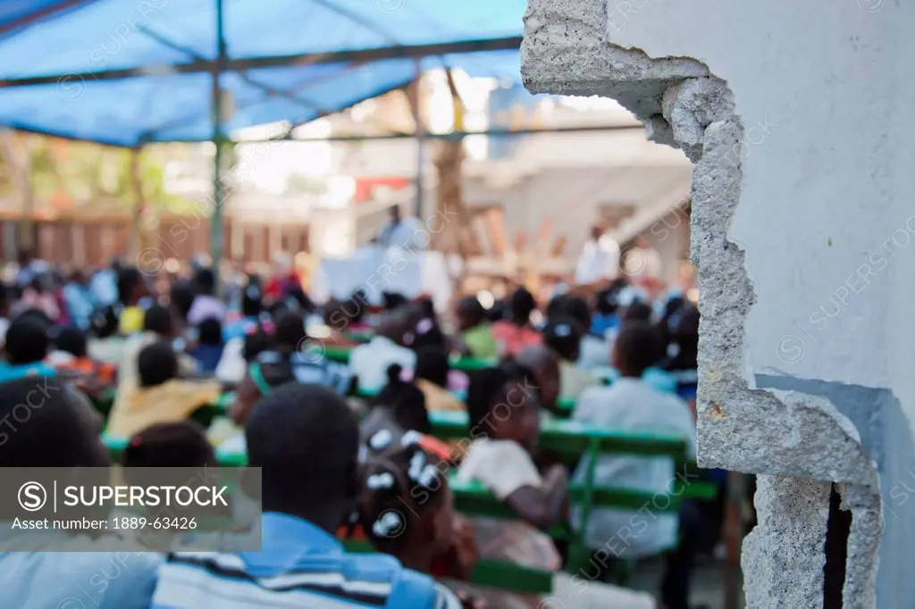 church meetings held under a tarp where a building once stood, port_au_prince, haiti