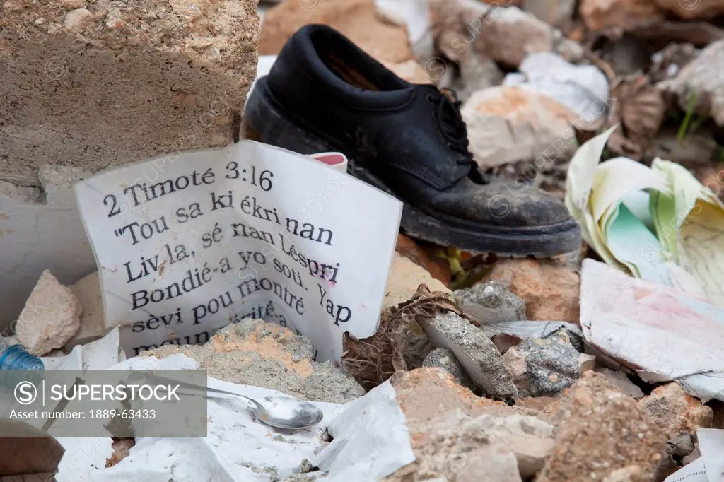 a bible verse 2 timothy 3:16 laying in the ruins after the haiti earthquake, port_au_prince, haiti