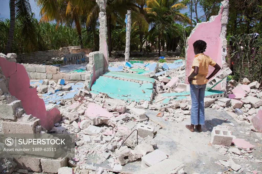 looking on with grief at what was once a home, port_au_prince, haiti