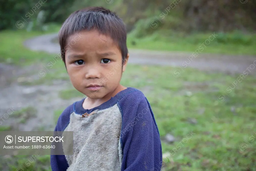 portrait of a young filipino boy outdoors, negros island, philippines