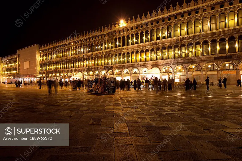 people in st. mark´s square at night, venice italy