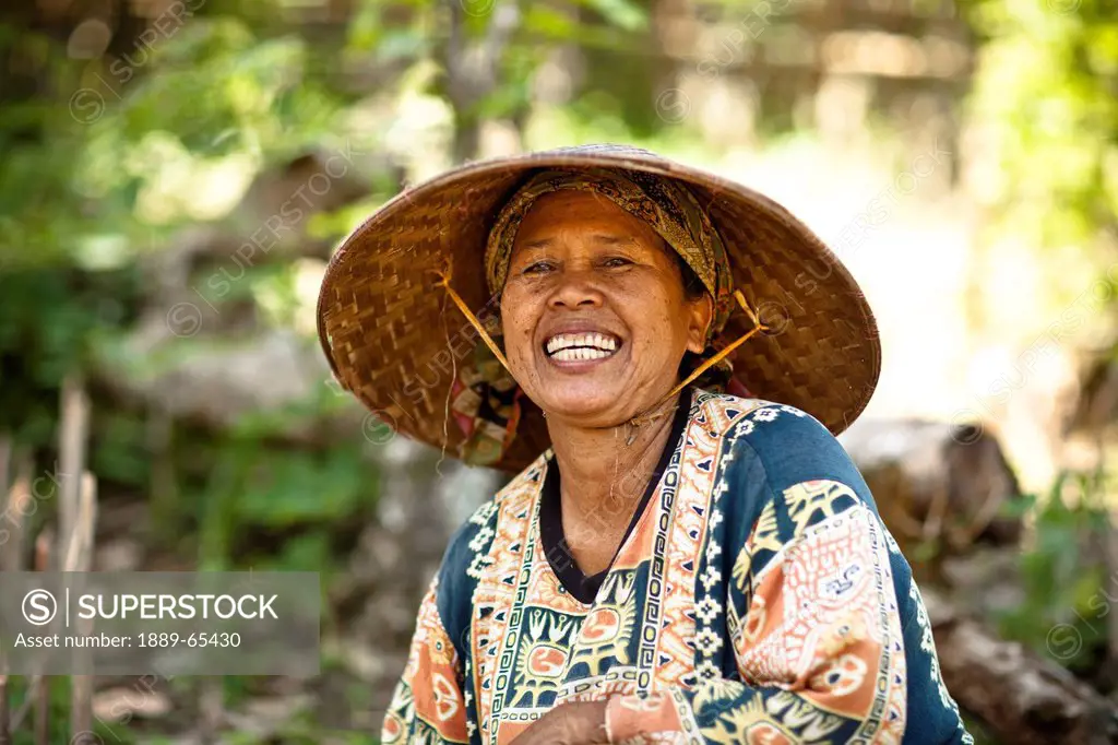Portrait Of A Woman Wearing A Conical Hat, Muara Pinang Sumatera Selatan Indonesia