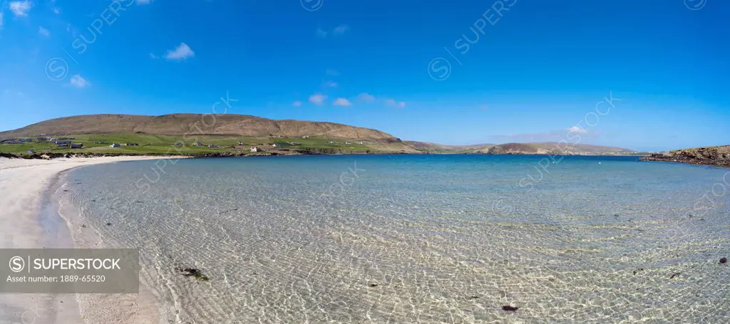 a beach along the coast, shetland scotland
