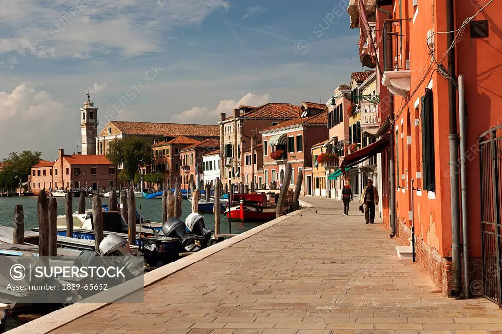 a street along the water, murano italy